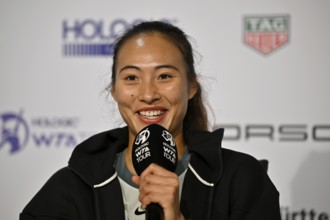 Qinwen Zheng (CHN) portrait, smiles, microphone, mike, logo, WTA, press conference, press