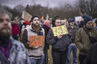150, 000 people gather around the Bundestag in Berlin to build a human wall against the shift to