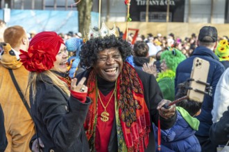 Audience at the Rosenmontagszug carnival parade in Düsseldorf, North Rhine-Westphalia, Germany,