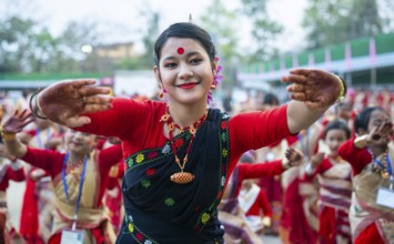 Participants with an instructor dance on the final day of a Bihu dance workshop ahead of Rongali