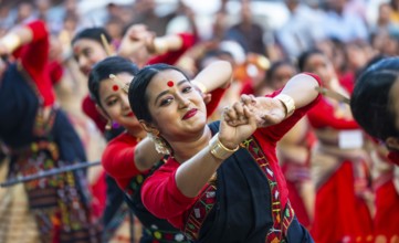 Participants with instructors dance on the final day of a Bihu dance workshop ahead of Rongali Bihu