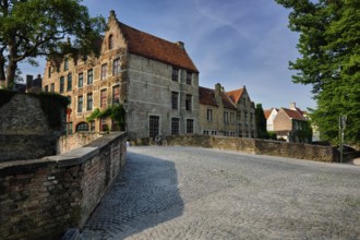 Bruges typical Belgian cityscape Europe tourism concept, canal and old houses and bridge. Brugge,