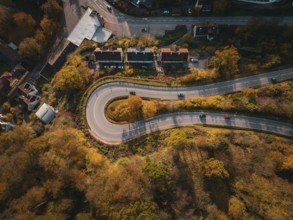 Aerial view S-curve in autumn, Calw, Black Forest Germany
