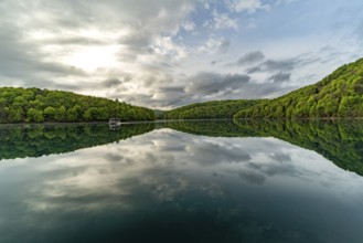 Electric tourist boat on the largest lake Kozjak in Plitvice Lakes National Park, Croatia, Europe