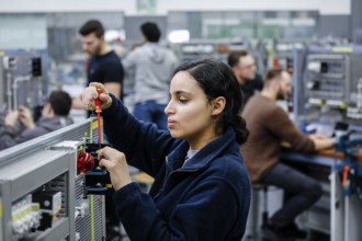 Remscheid, North Rhine-Westphalia, Germany - Trainee woman in electrical professions, an industrial