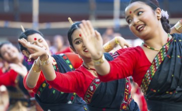 Participants with instructors dance on the final day of a Bihu dance workshop ahead of Rongali Bihu