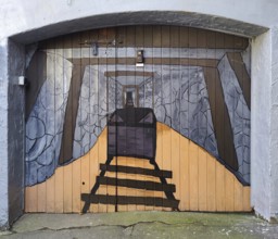 Painted garage door as a gallery with mine car, mining past, nostalgia, Goslar, Lower Saxony,