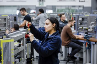 Remscheid, North Rhine-Westphalia, Germany - Trainee woman in electrical professions, an industrial