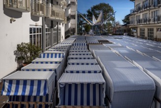 Beach chairs on the promenade, transport to the beach, Binz, Rügen, Mecklenburg-Vorpommern,
