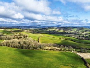 Farms over Morcombelake Village from a drone, Bridport, Dorset, England, United Kingdom, Europe