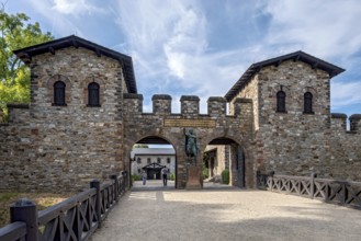 Main gate, Porta Praetoria with bronze statue of Emperor Antoninus Pius, Saalburg Roman fort,