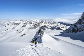 Mountaineer with ice axe and crampons, ascent through steep snowfield to Piz Kesch or Piz d'Es-cha