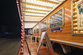 Illuminated wooden checkout area in evening light, Böblingen, Germany, Europe