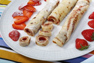 Swabian cuisine, filled pancakes, Flädle with strawberry jam, icing sugar, Gsälz, fresh