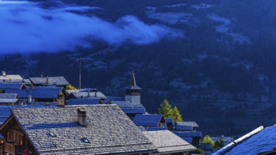 Roofs covered with hoarfrost, fog rising, Grimentz, Val d'Anniviers, Valais Alps, Canton Valais,