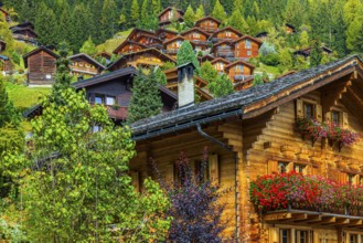 Wooden chalet decorated with flowers, Grimentz, Val d'Anniviers, Valais Alps, Canton Valais,