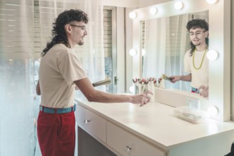 Makeup artist disinfecting and sanitizing workstation with spray bottle in beauty salon, getting