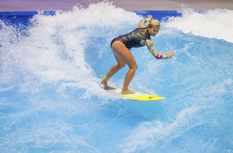 Messe boot Düsseldorf, Surfer riding a standing indoor wave on the occasion of a press event,