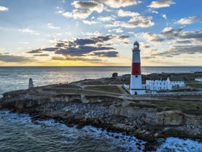 Sunset over Portland Bill Lighthouse from a drone, Portland Bill, Isle of Portland, Dorset,