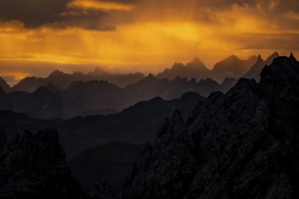 Montafon mountains with dramatic cloudy sky at sunrise, Tschagguns, Rätikon, Montafon, Vorarlberg,