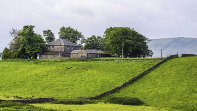 Farms over Upper Teesdale and River Tees, Forest-in-Teesdale village, County Durham and Cumbria,