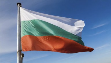 Flags, the national flag of Bulgaria flutters in the wind