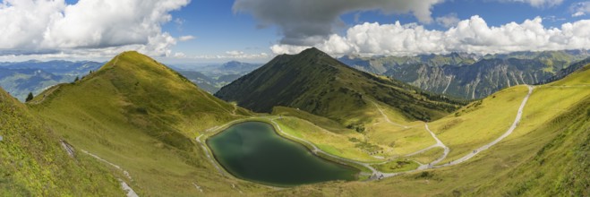 Riezler Alpsee, an artificial lake, snow pond, feeds the snow cannons that provide complete snow