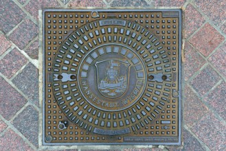 Manhole cover with the coat of arms of Wismar, Wismar, Mecklenburg-Vorpommern, Germany, Europe