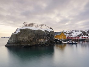 Large rock in the harbour of the authentic fishing village of Nusfjord, Flakstadøya, Lofoten,