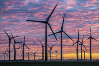 Wind farm near the East Frisian town of Norden, east of the town, sunset, Lower Saxony, Germany,