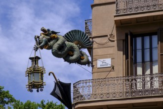 Dragon lamp and umbrella at Casa Bruno Cuadros, Barcelona, Catalonia, Spain, Europe