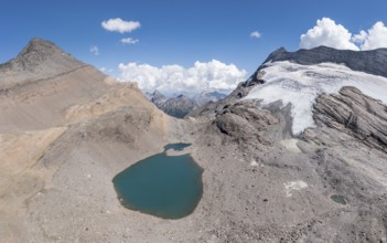 Panorama aerial view of glacial lake, SAC hut monte leone, near Simplon mountain pass, Switzerland,
