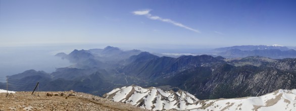 View of the Turkish Riviera from the snow-covered Tahtali Dagi, Turkey, Asia