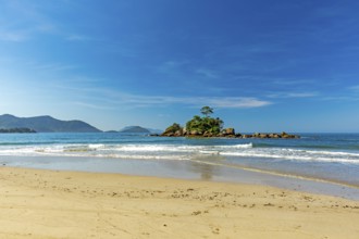 Small rocky islet on Bonete beach in Ilhabela on the coast of Sao Paulo, Bonete beach, Ilhabela,