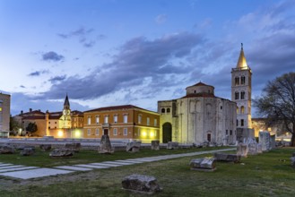The Church of St Donatus, remains of the Roman forum and the bell tower of Zadar Cathedral at dusk,