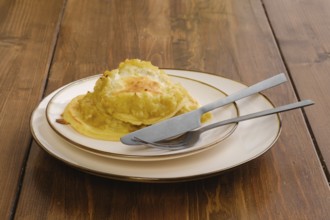 Portion of fried apple pancakes on a plate