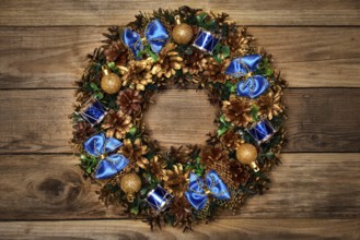Christmas wreath on wooden background