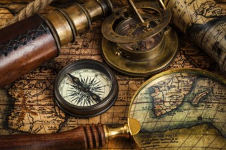 Travel geography navigation concept background, old vintage retro compass, sundial, magnifying