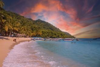 Tela, Honduras, January 2020: Local transport boats at Cocalito beach in Punta de Sal on the