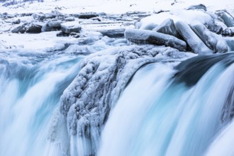 Godafoss waterfall, icy and snowy rock face, Northern Iceland Eyestra, Iceland, Europe