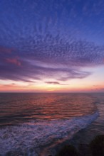 Ocean sunset on rocky coast. Varkala resort, Kerala, India, Asia
