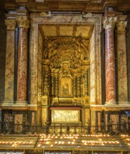 Golden side altar with image of the Virgin Mary and burning candles, Cathedral of Santa Maria