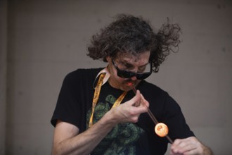 Detroit, Michigan, Artists create glass and other artworks at the Michigan Glass Project's annual