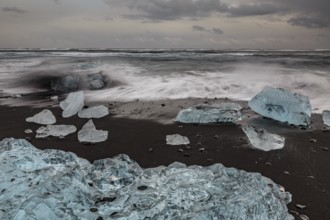Ice floes on the beach, waves, sea, clouds, winter, Diamond Beach, Breidamerkursandur, Jökulsarlon,