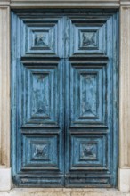 Old blue historic wooden door, dilapidated, withered, peeling, paint, craftsmanship