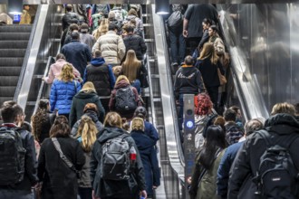 Public transport, underground, main station exit, many people crowding out of the underground