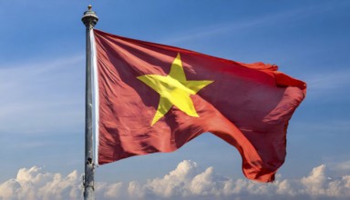 Flags, the national flag of Vietnam flutters in the wind