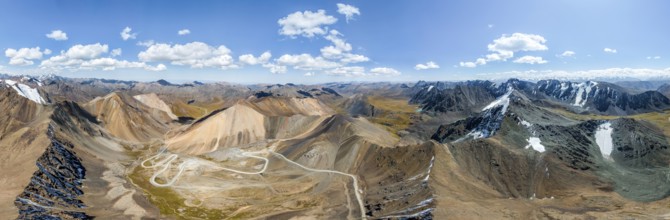 Panorama, aerial view, road with serpentines, mountain pass in the Tien Shan, Chong Ashuu Pass,