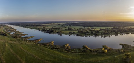 Panorama aerial view of river Elbe near Lenzen, view towards Höhbeck radio mast, calm summer