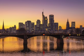 The lights of Frankfurt's banking skyline glow in the evening after sunset, Frankfurt am Main,